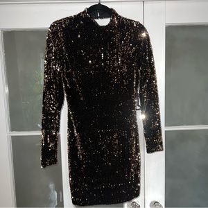 Gold and black sequin mini dress